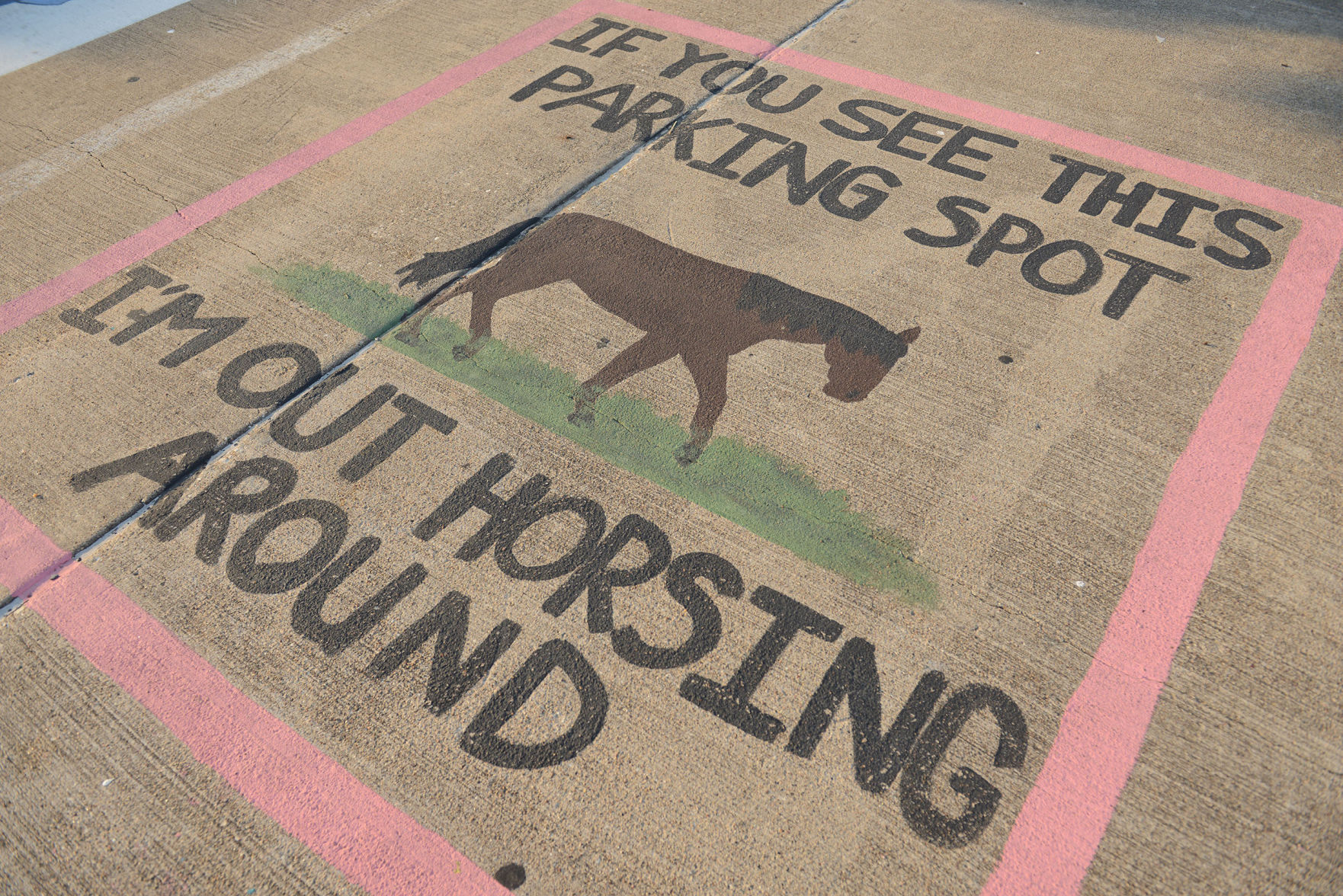 A&M Consolidated HS painted parking spots